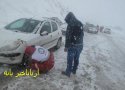 امدادرسانی دواطلبان هلال احمر بانه  به مسافران گرفتار در برف و کولاک /8 عکس